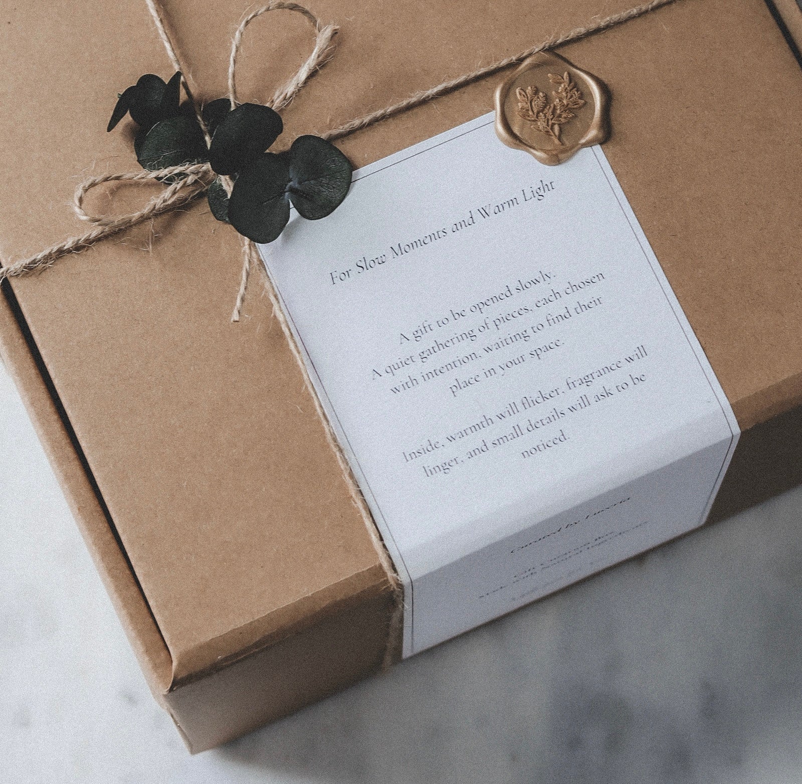 Gentle gift ideas for scent-sensitive people featuring soft candles and calming home items.