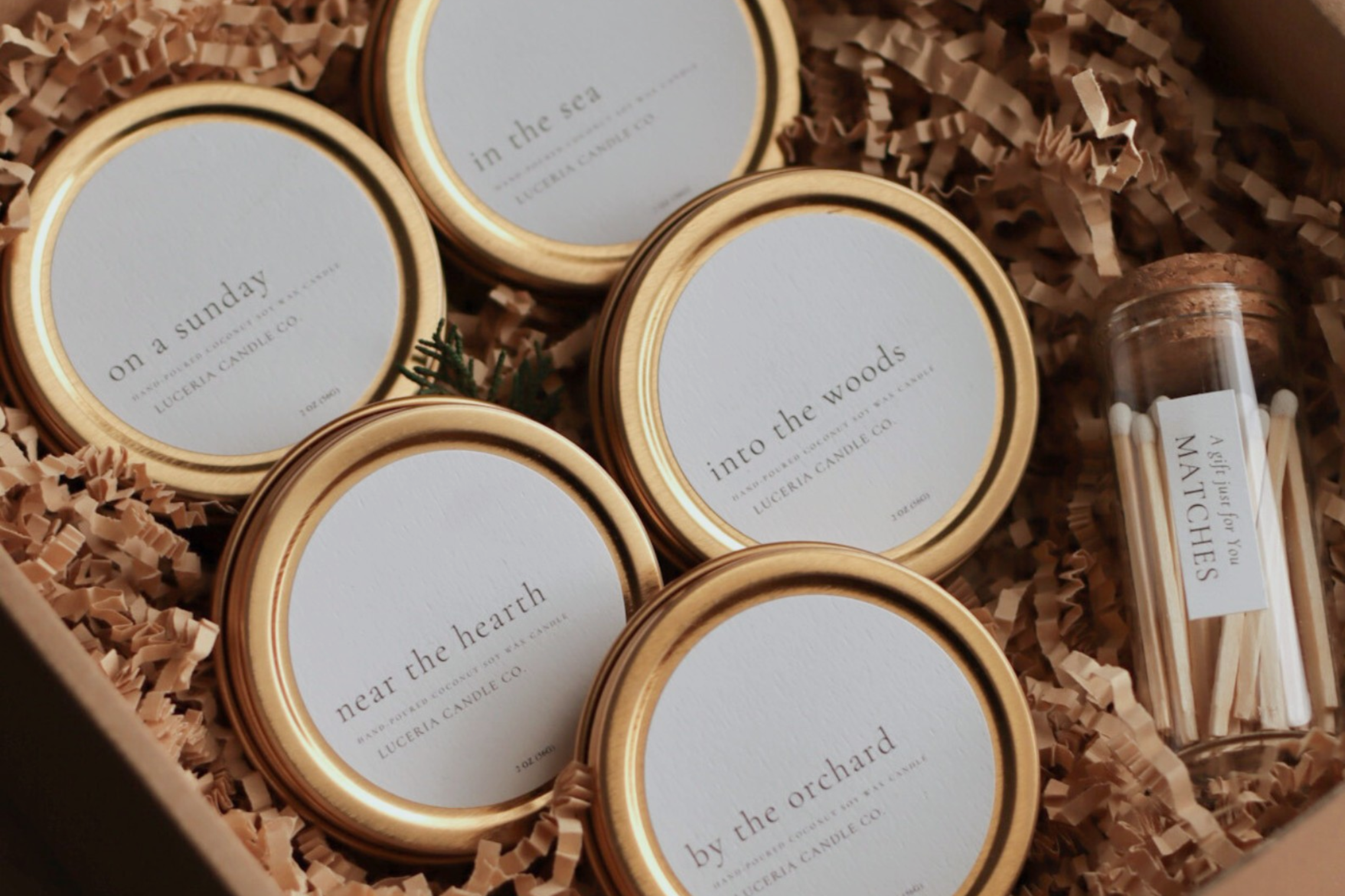 Gentle gift ideas for scent-sensitive people featuring soft candles and calming home items.