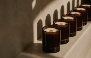 Gentle gift ideas for scent-sensitive people featuring soft candles and calming home items.