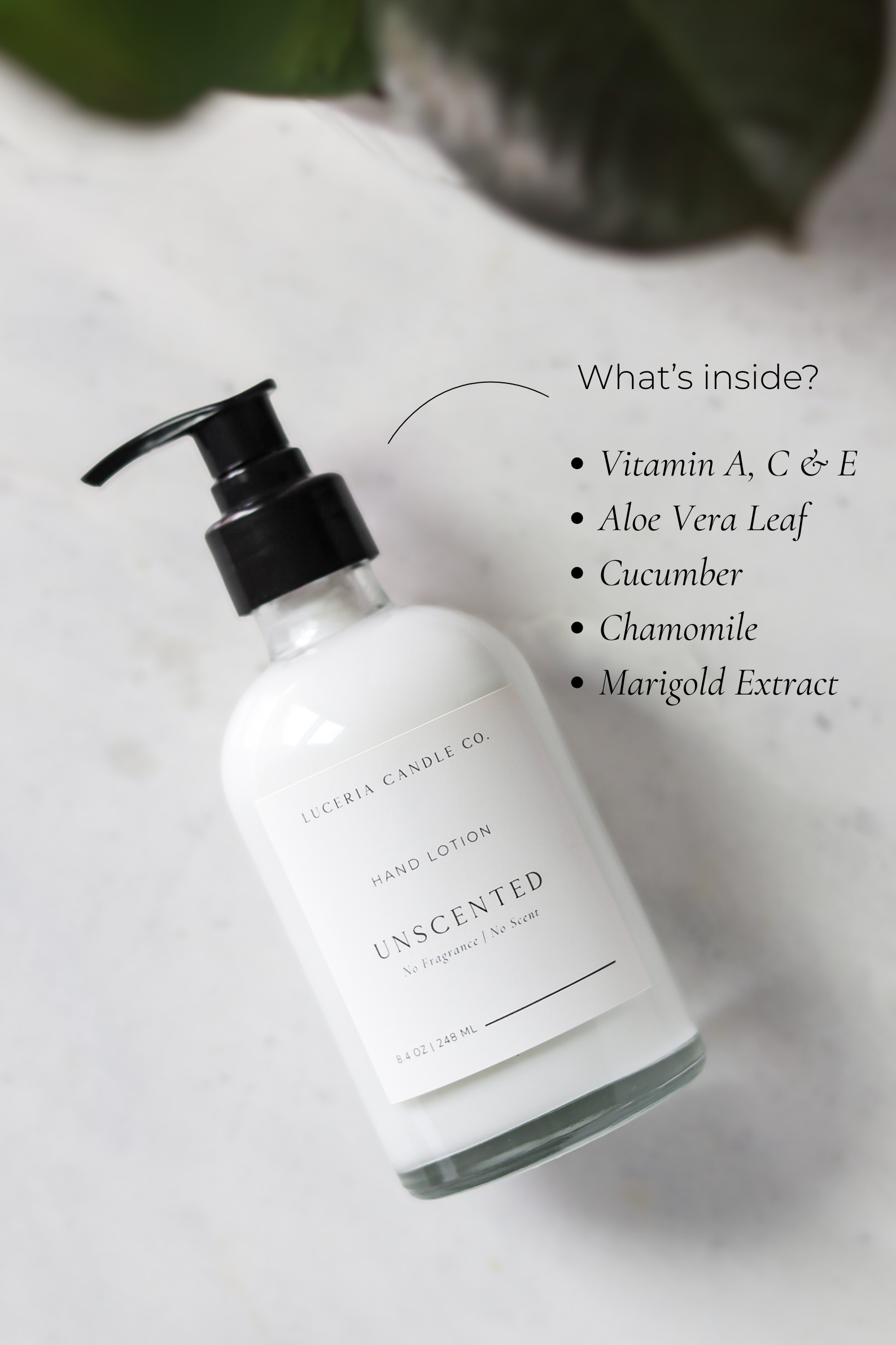 Hand lotion bottle with ingredients listed on a light background