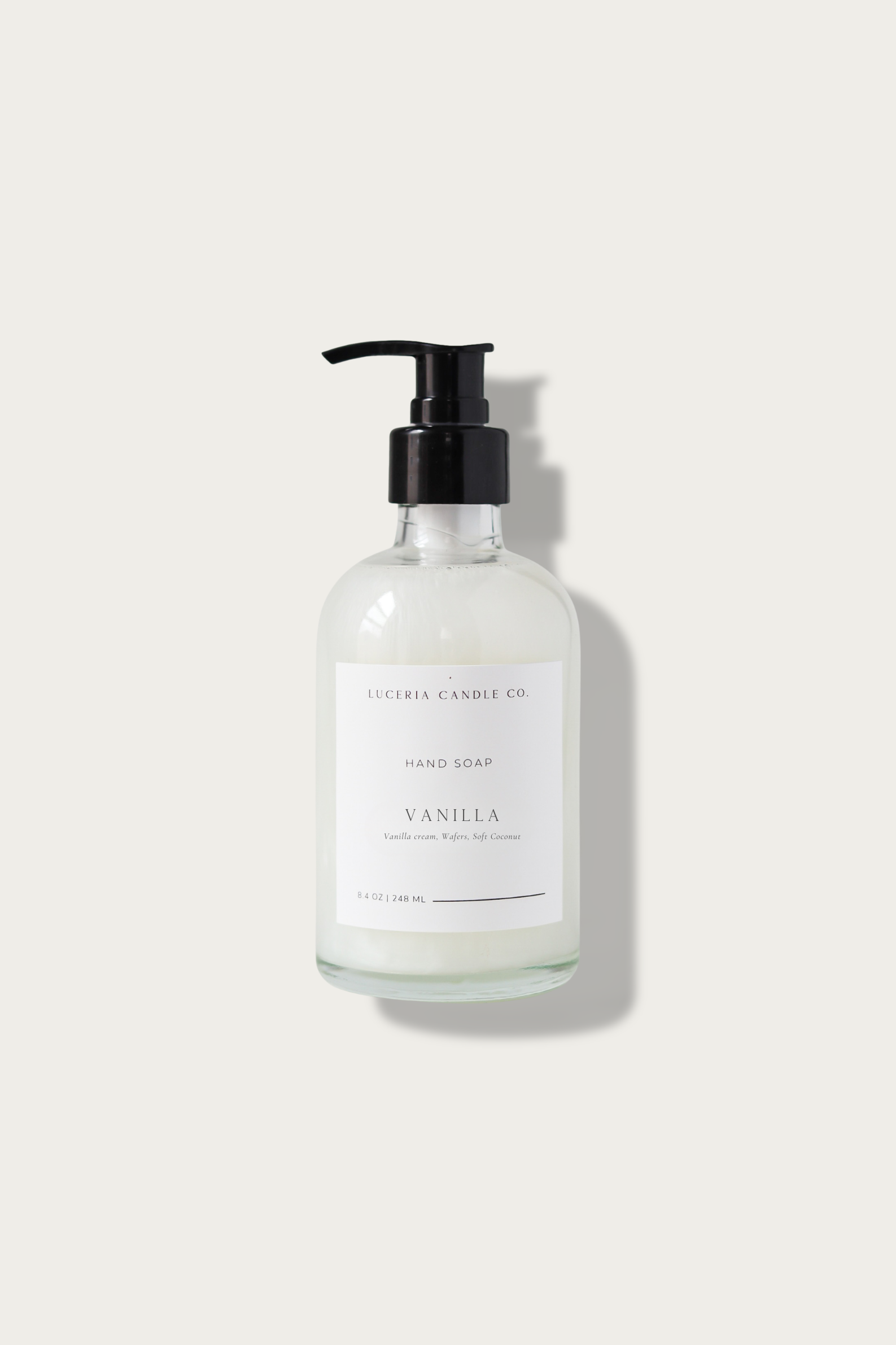Hand soap bottle with pump on a white background