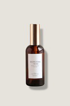 Brown bottle with a white label on a light gray background