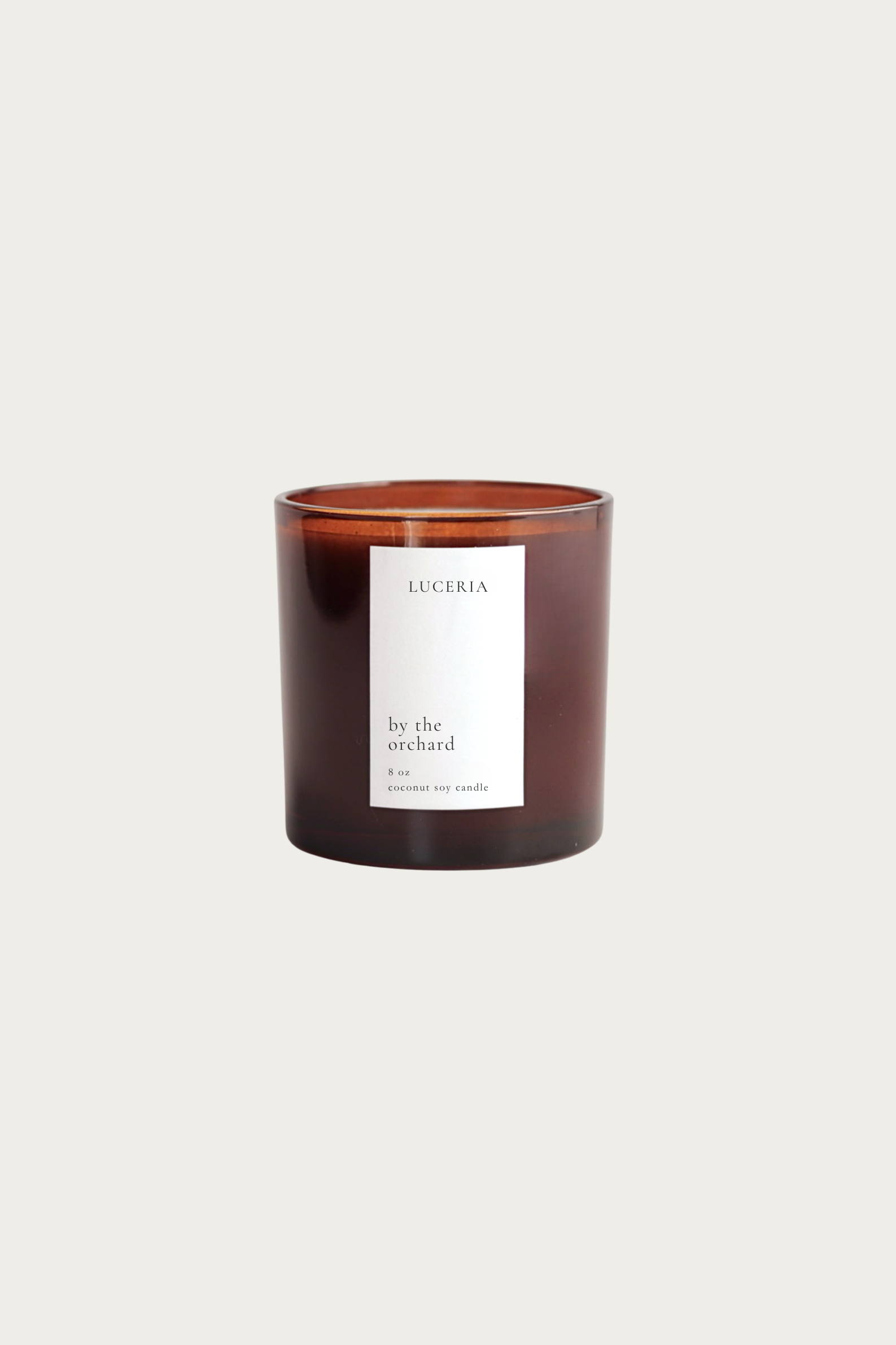 Persimmon citron scented candle with a label on a white background