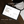 A tablet, laptop, and phone are arranged on a dark wooden table with overlaid text reading 'CANDLE BATCH Calculator' by Studio Noven Co. The screen shows a minimalist website calculator interface.