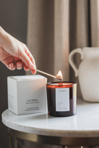 In the Sea candle on marble table with Luceria brand box