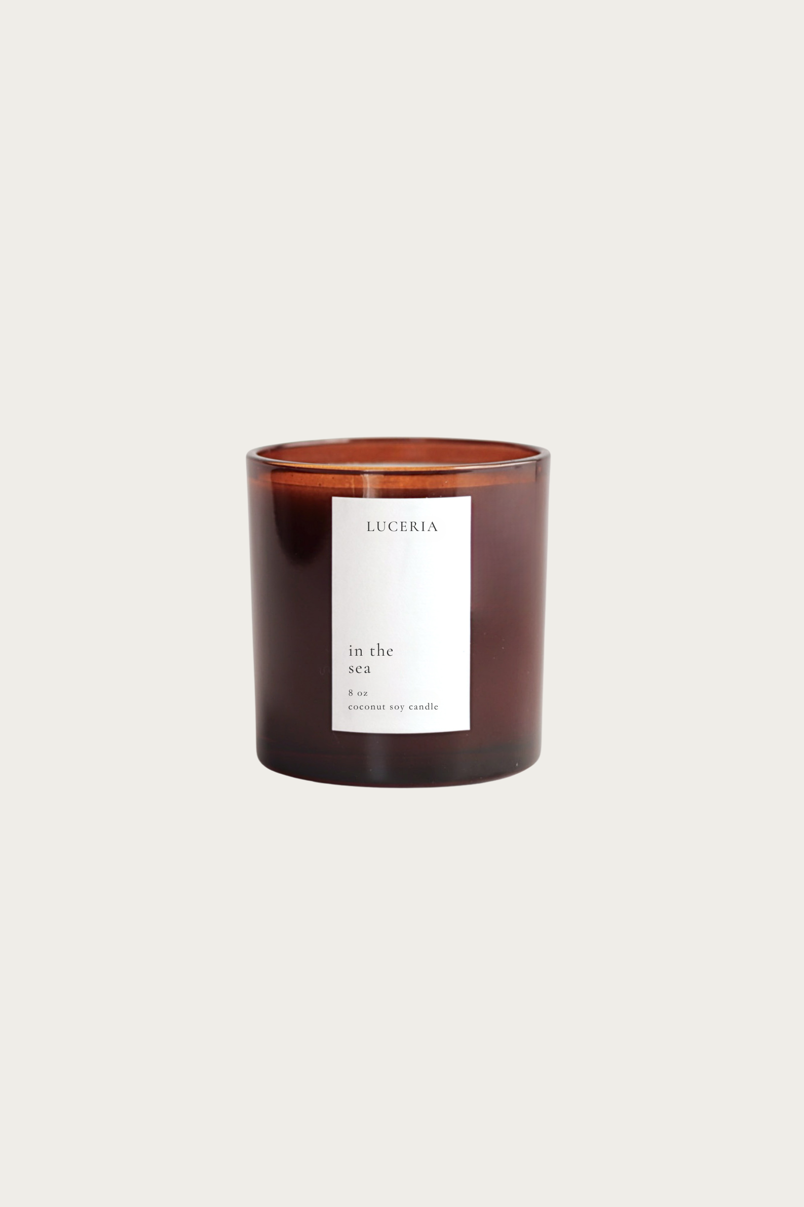 Sea scented candle with a label on a white background