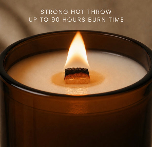 A close-up of a lit Luceria candle in a dark amber glass jar, with a single wick and a glowing flame. White text at the top reads, 'STRONG HOT THROW UP TO 90 HOURS BURN TIME.