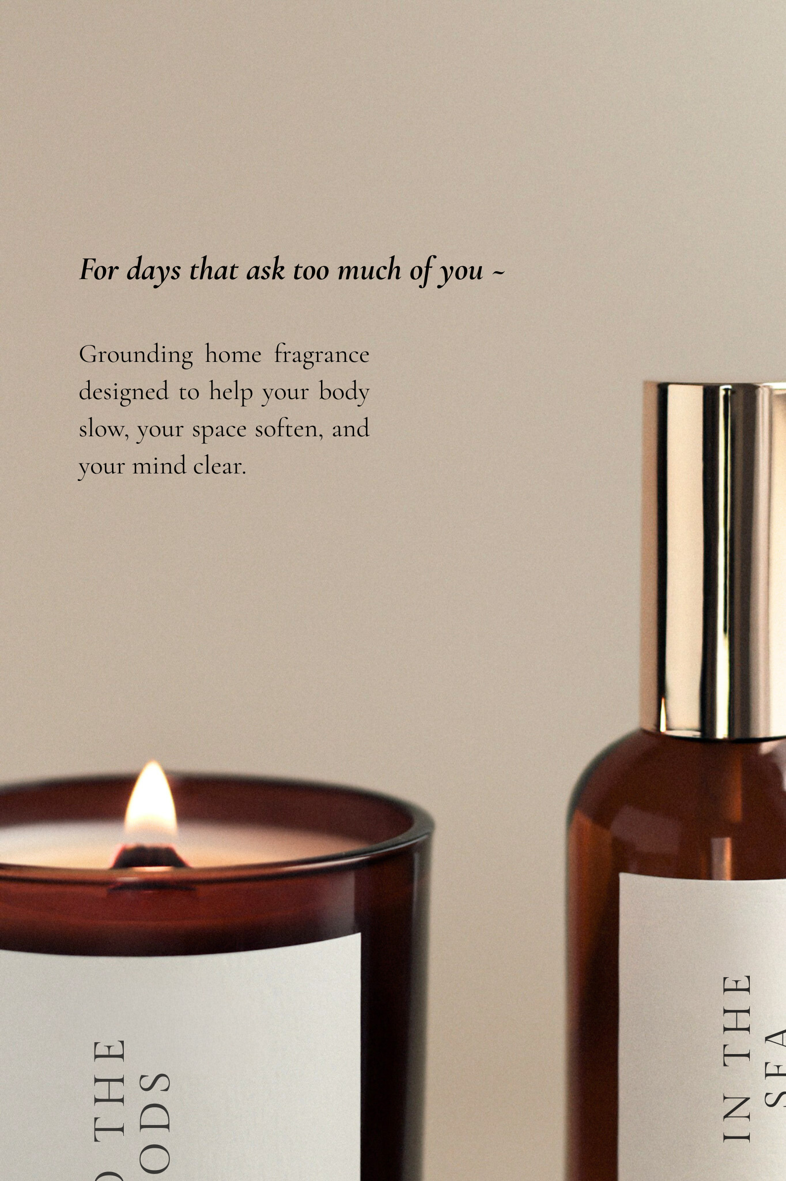 Candle and bottle with text on a beige background