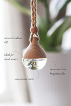 Hanging wooden diffuser with clear liquid, ideal for small spaces and featuring a natural wooden cap.