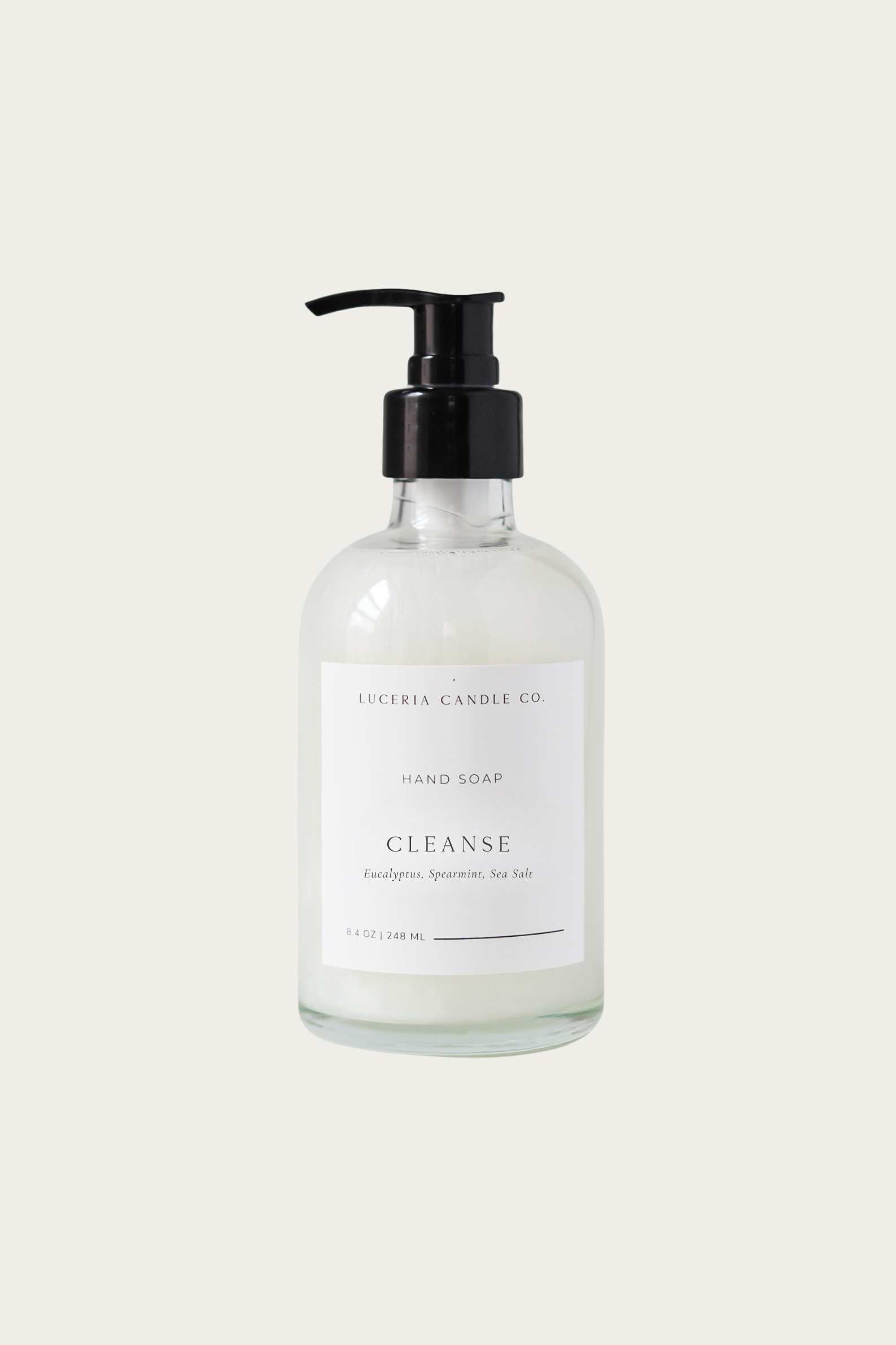 Hand soap bottle labeled 'Cleanse' by Luceria Candle Co. on a white background
