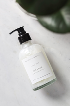 Eucalyptus scented hand soap bottle with pump on a light surface