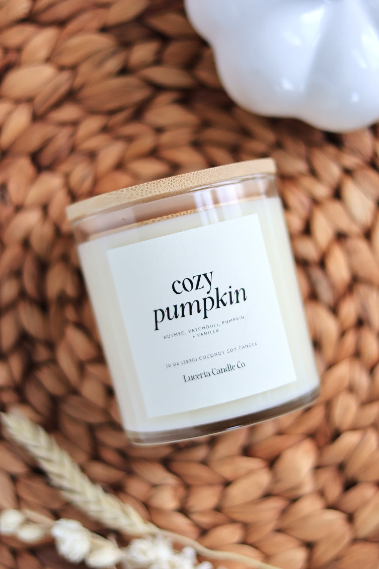 Cozy Pumpkin Candle from Luceria Candle Co. - Fall scented candle available in 10 oz, 5 oz, and 2.5 oz sizes, made with eco-friendly soy wax for a warm autumn ambiance.