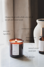 In the sea candle with a label on a surface, accompanied by text describing product features.