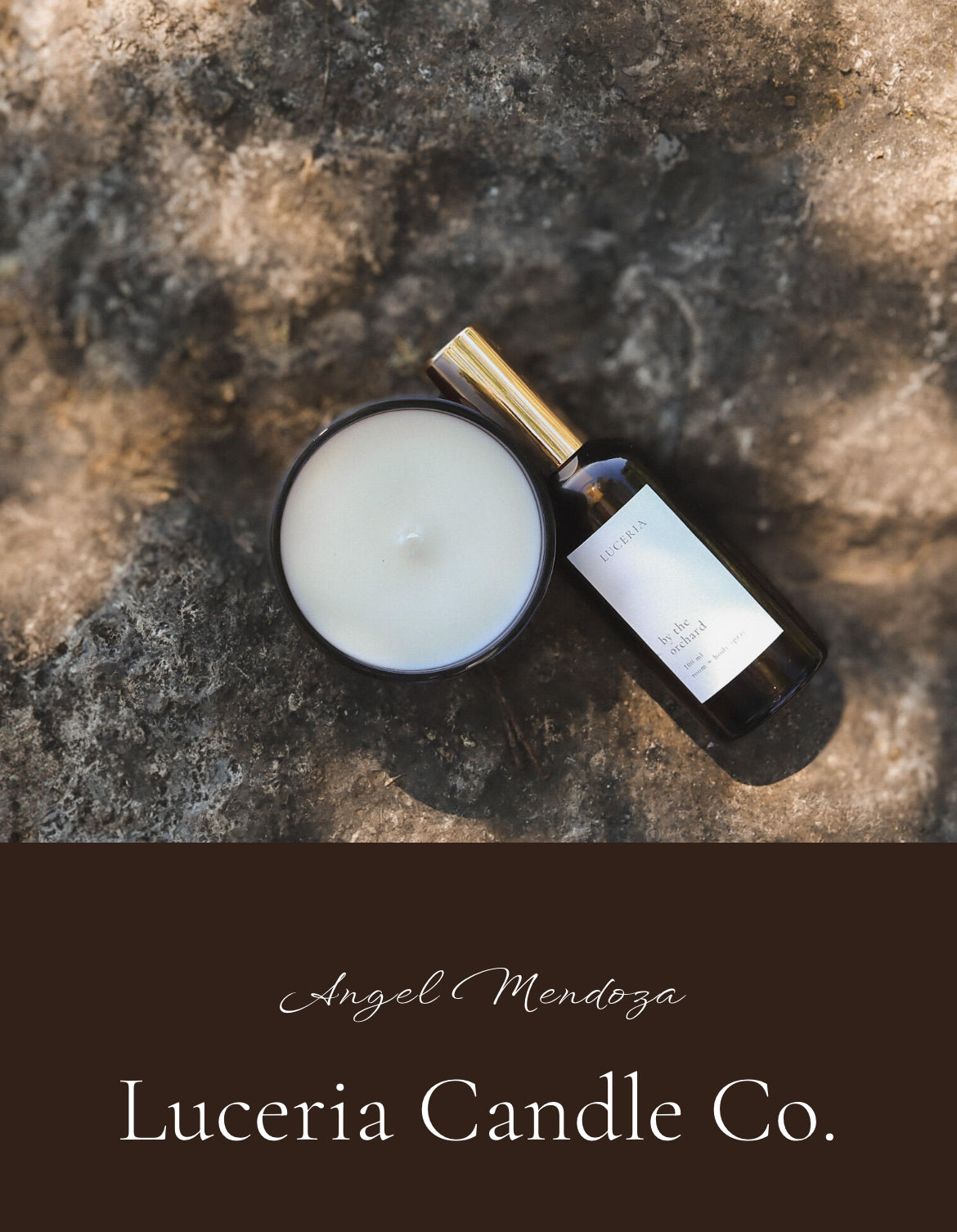 Candle and bottle on a textured surface with 'Luceria Candle Co.' branding.