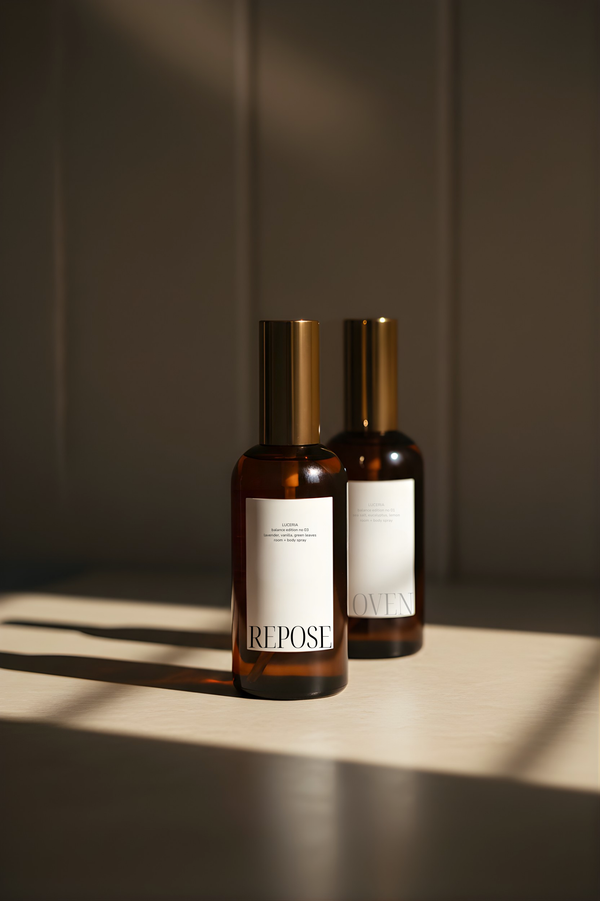 Luceria No. 03 Repose lavender and vanilla room spray in an amber glass bottle styled in warm natural light with a minimal neutral interior.