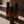 three black cap amber spray bottles with Luceria branding in a neutral ritualistic minimalist style
