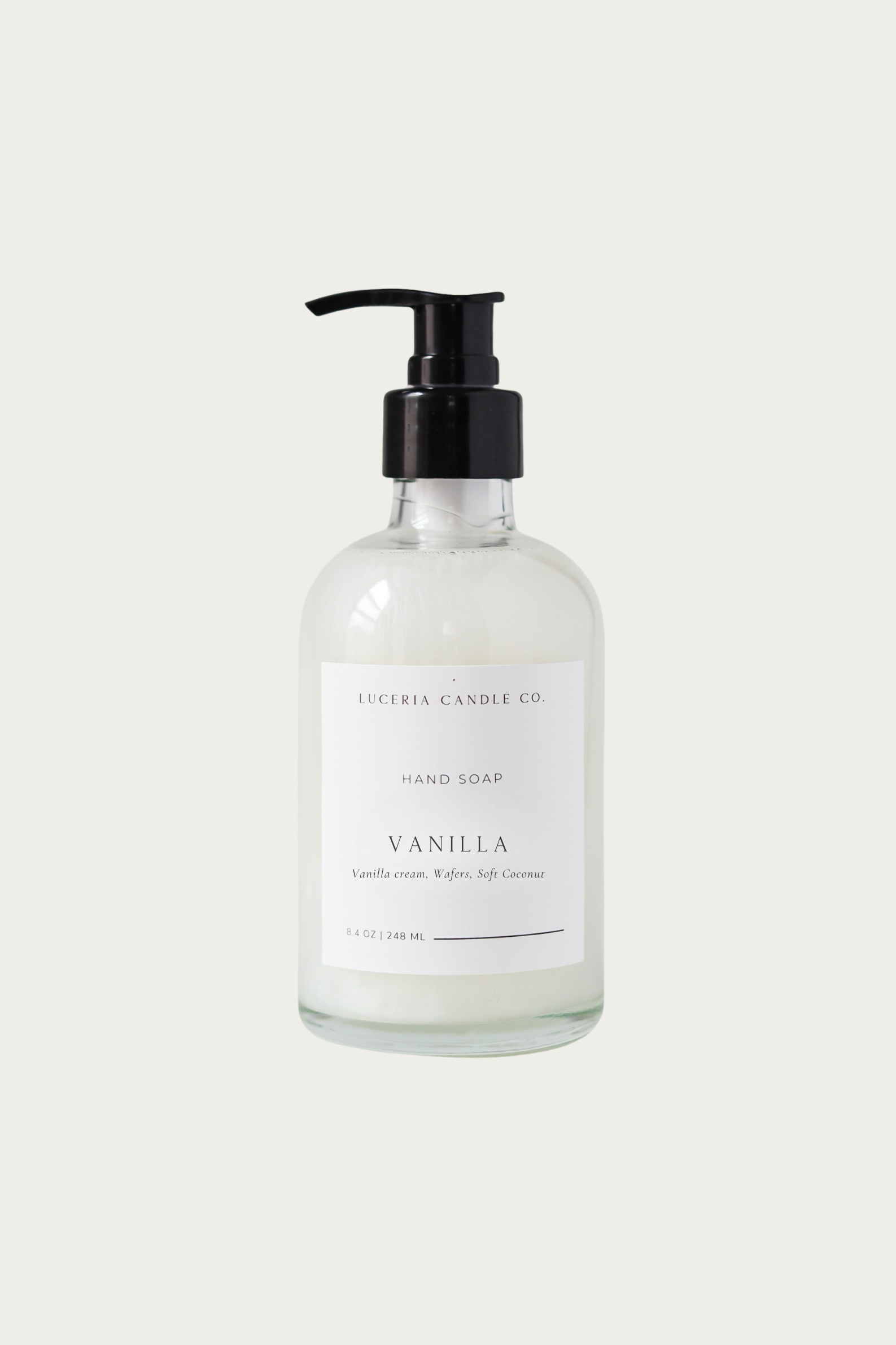 Hand soap bottle with pump labeled 'Vanilla' by Luceria Candle Co. on a white background